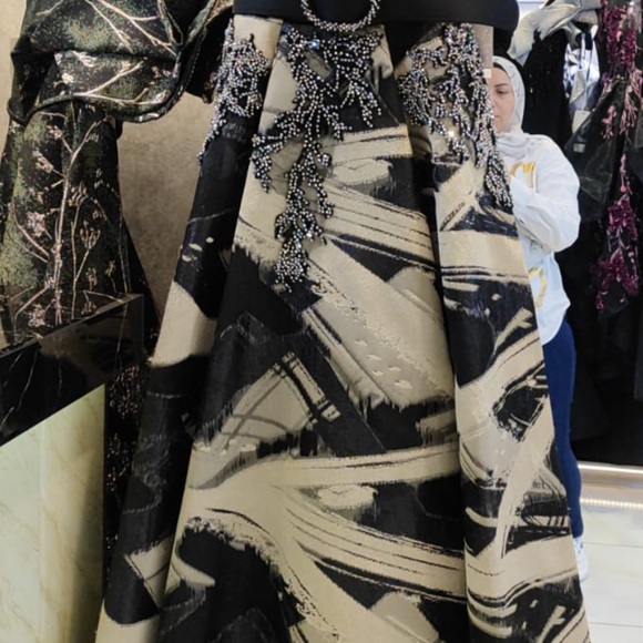 Elegant Black and Beige Gown with Beaded Details
